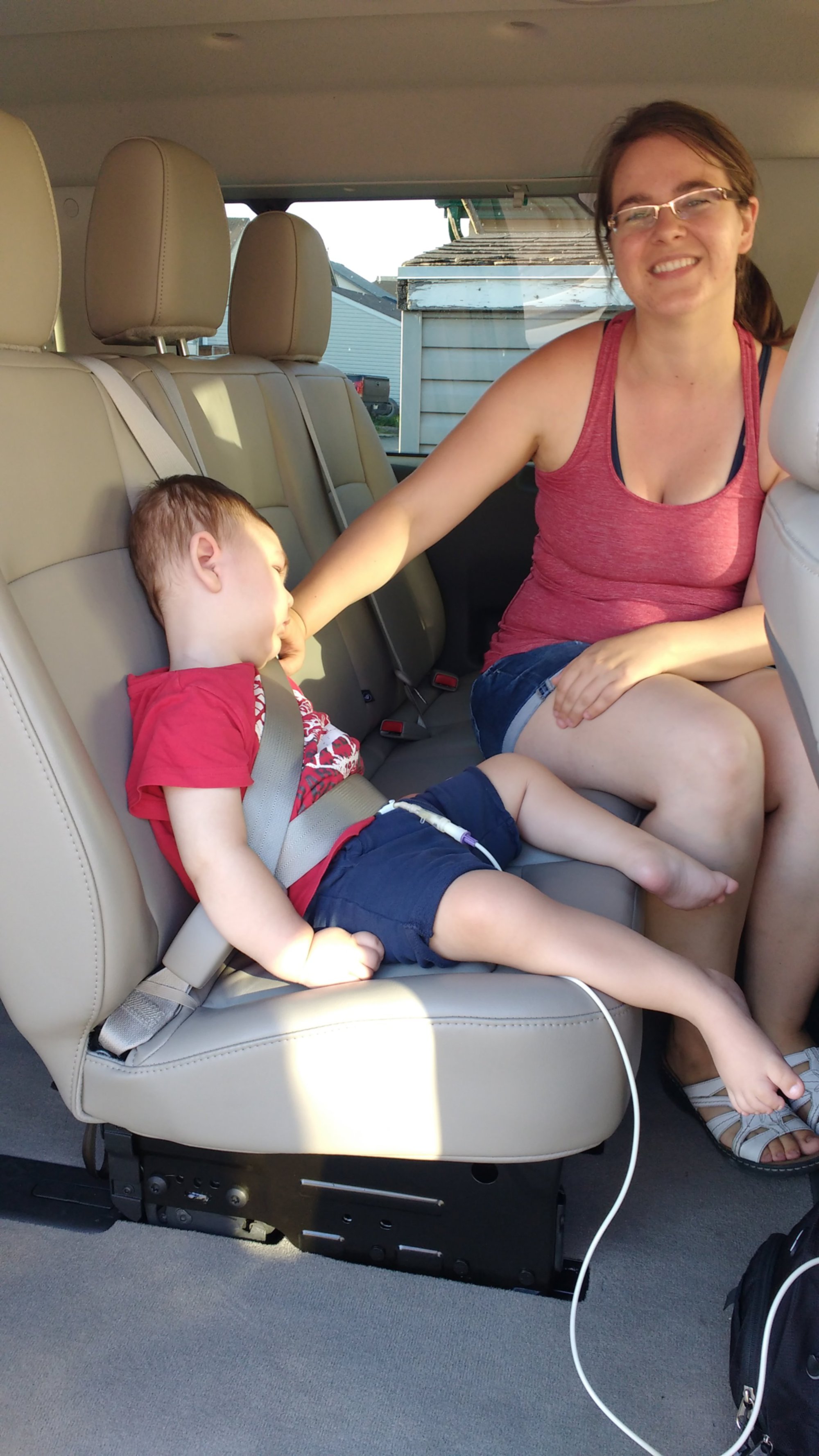 Félip sitting like a big boy in a big van